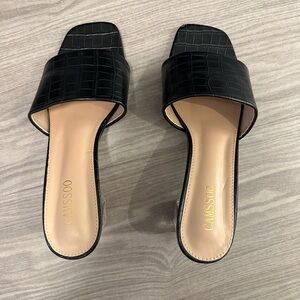 Black croc block heels